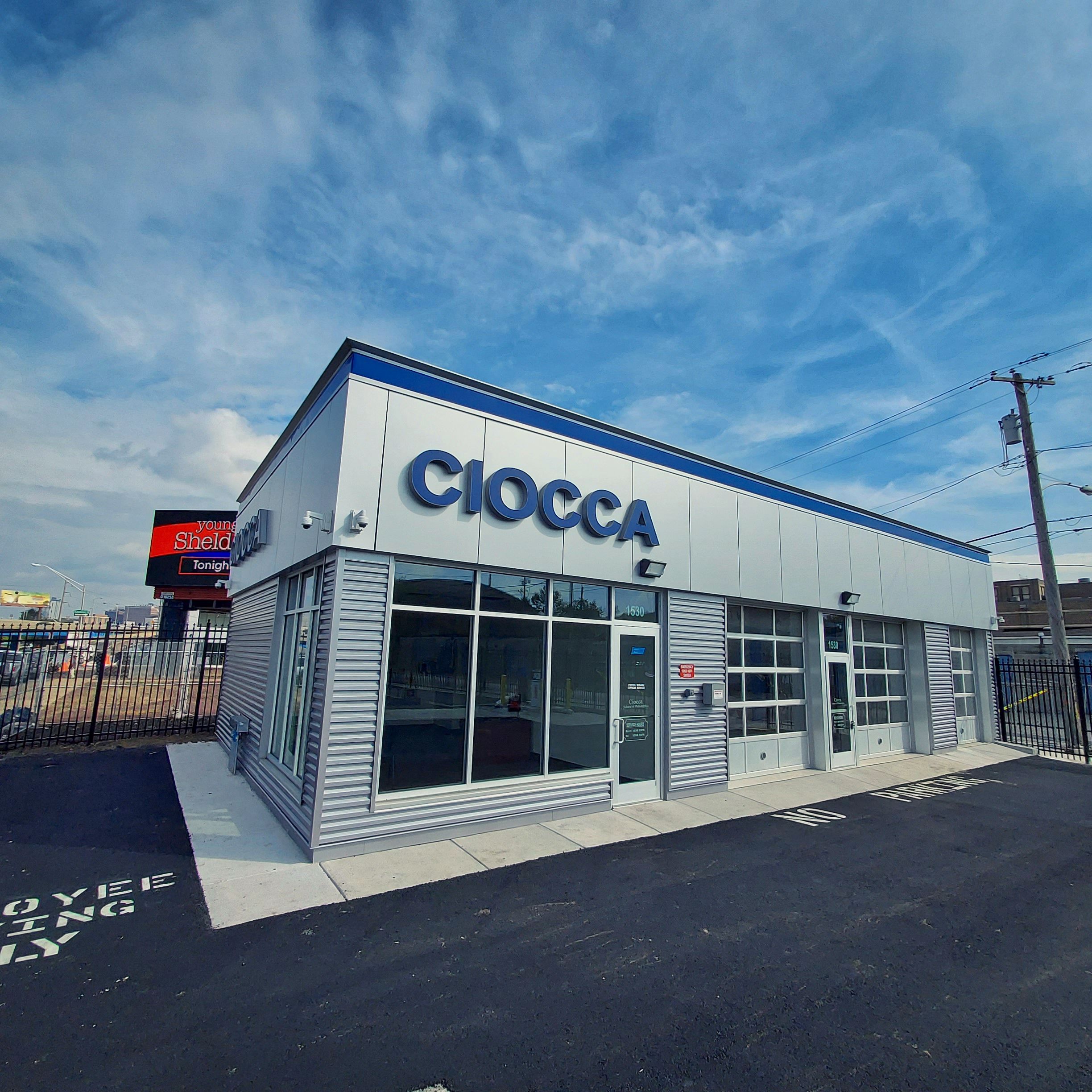 Picture of the outside of a Ciocca dealership lot.