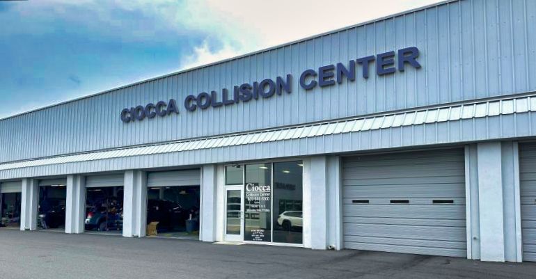 Picture of the outside of a Ciocca dealership lot.